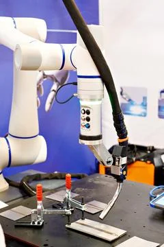 Welding machine and robotic arm Stock Photos