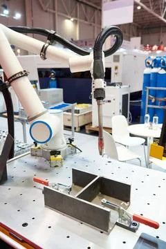 Welding machine and robotic arm Stock Photos