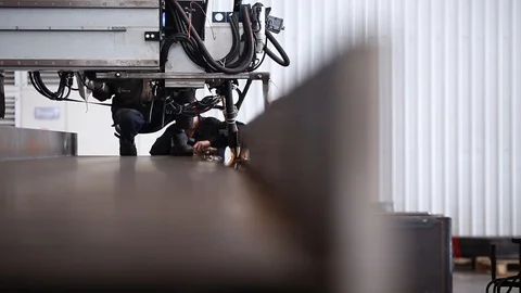 Welding on the machine of a metal part Stock Footage 118575518