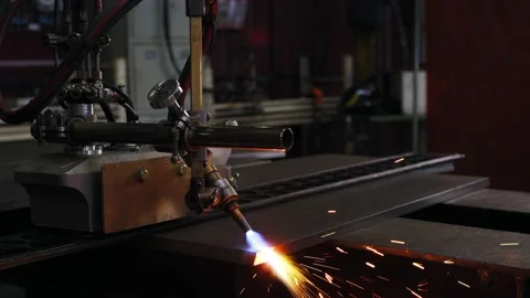 A welding machine is processing the edge of a metal sheet Stock Footage 163295761