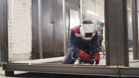 Welding machine in the production of metal construction Stock Footage 88331216
