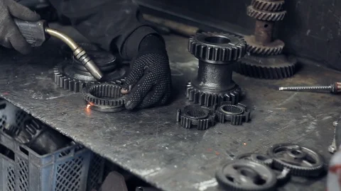 Welding of metal gears Stock Footage 98650922