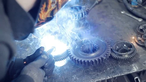 Welding of metal gears Stock Footage 100323979