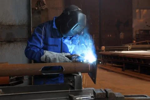 Welding of metal structures, worker welds metal structural elements. 写真素材