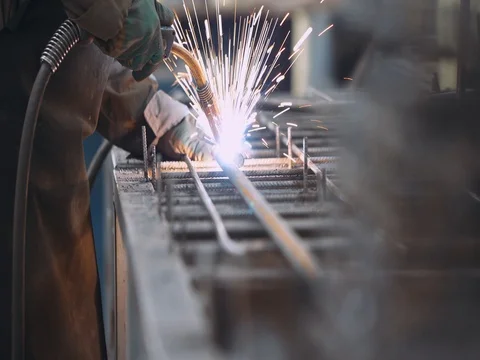 Welding of metal, worker welds metal construction, welded tool. 4k. Stock Footage