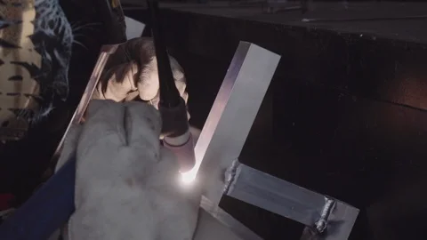 Welding operator in an auto repair shop Stock Footage 93612970
