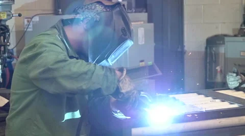 Welding Operator Working in a Metal Shop Stock Footage 53458714