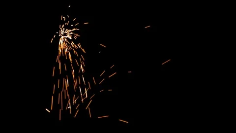 Welding Particles Falling On A Black Background Stock Footage 76466148