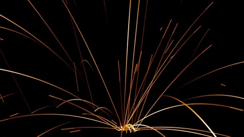 Welding Particles Falling On A Black Background Stock Footage 76466162