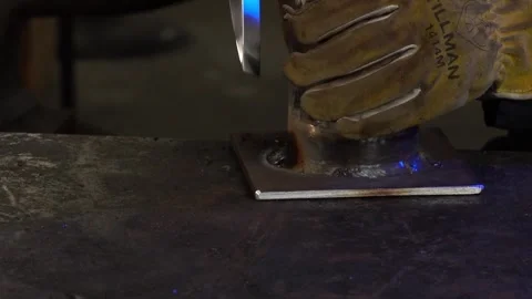 Welding Pick and Welding Brush Removing Slag. Slow Motion Stock Footage 254745172