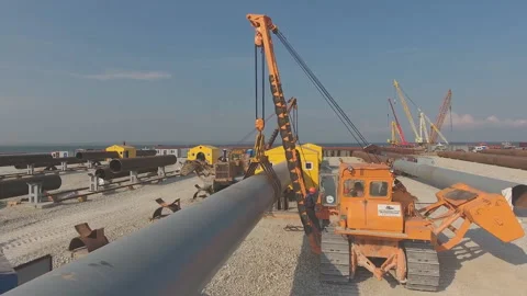 Welding piles  assembly of bridge supports. Stock Footage 104181345
