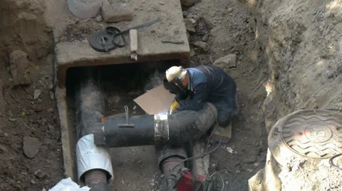 Welding pipe, welder right Stock Footage 35090401