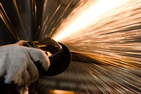 Welding process and sparking welding machine in the hands Stock Photos
