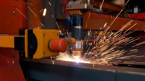 Welding process with robotic welding machine for machinery manufacturing Stock Photos