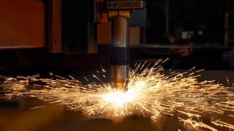 Welding process with robotic welding machine for machinery manufacturing Stock Photos