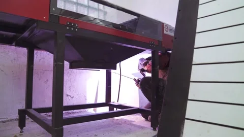 Welding process with sparks and flashes. Melat welder in safety equipment Stock Footage 164548809