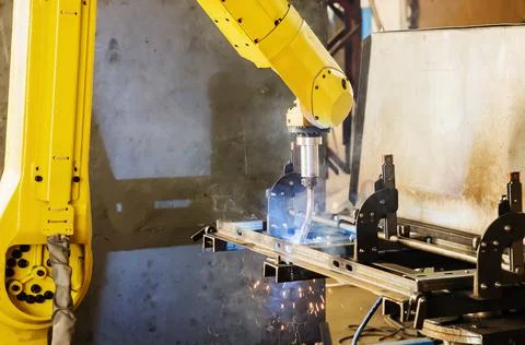 Welding robot in operation Stock Photos