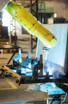 Welding robot in operation Stock Photos