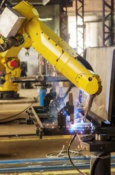 Welding robot in operation Stock Photos