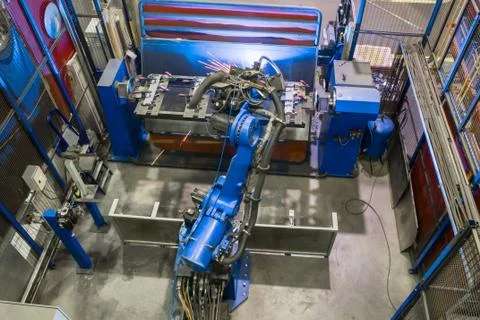 Welding robot in the process. Modern welding production. Stock Photos