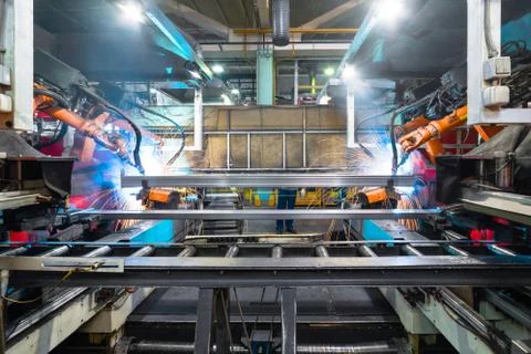Welding robot, the process of welding a metal profile. Stock Photos
