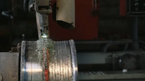 Welding robots apply overlay weld protection on the pipe disks. Automatic Video stock 84833465