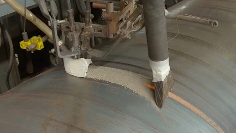 Welding robots movement in a weld for the creation of pipes. Stock Footage 76833698