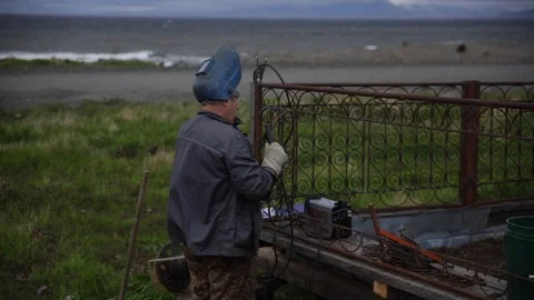 Welding by the sea 스톡 동영상 123244457