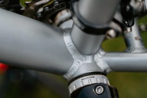 Welding seam of bicycle frame. Stock Photos