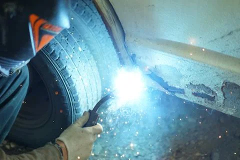 Welding by a semiautomatic device. Stock Photos