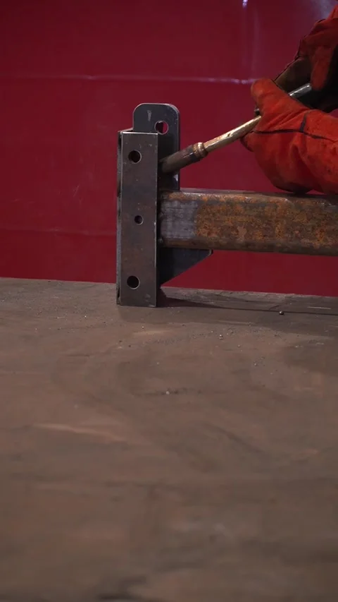 Welding with sparks close-up. Vertical shot Stock Footage 303968261