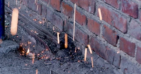 Welding sparks falling to the ground close up. Stock Footage 136243128