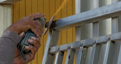 Welding sparks fly during metalwork process workshop action sequence indoor Stock Footage 329292862
