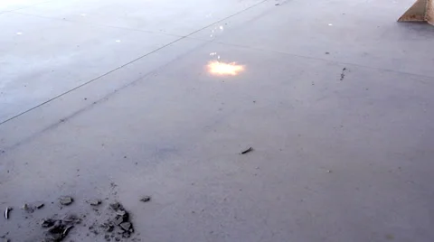 Welding sparks on ground cluster super slow motion Stock Footage