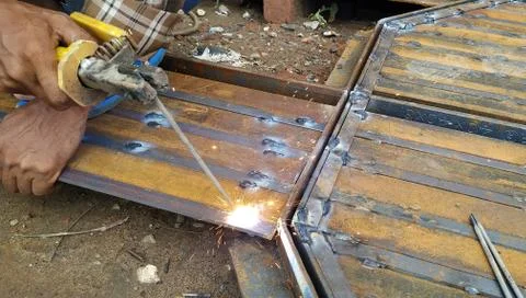 Welding sparks through electrical machine Stock Photos