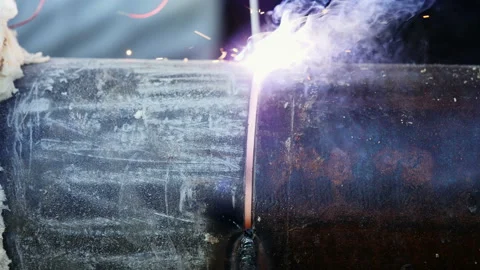 Welding steel pipe on a modern construction site Stock-Footage 88995919