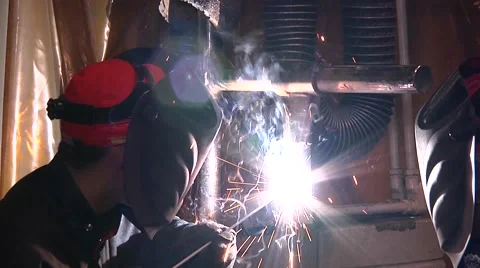 Welding student using arc stick welder Stock Footage 56436322