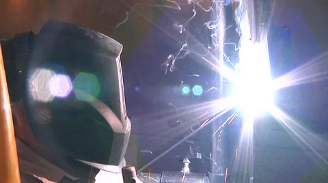 Welding student using arc welder Stock Footage 56436714