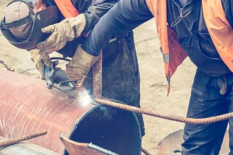 Welding teamwork, workers welding Stock Photos