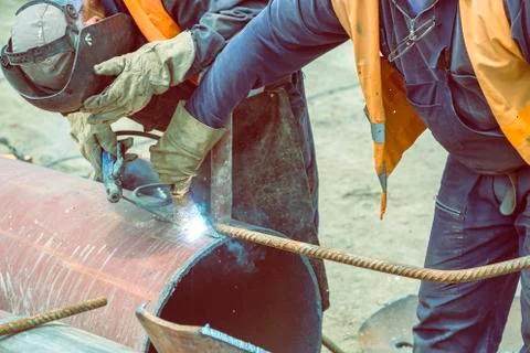 Welding teamwork, workers welding Stock Photos