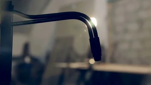 Welding torch, anvil in the workshop Stockbeeldmateriaal 76392617