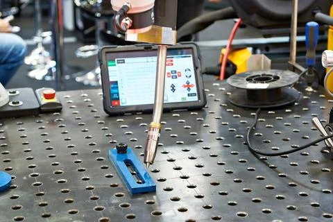 Welding torch of robotic manipulator with control panel Stock Photos