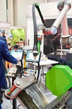 Welding torch of robotic manipulator with control panel Stock Photos