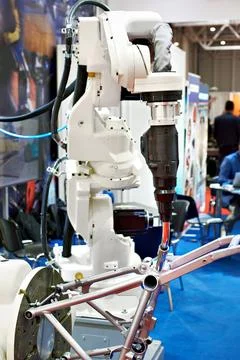 Welding torch of robotic manipulator Stock Photos