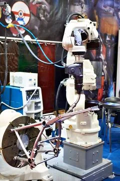 Welding torch of robotic manipulator Stock Photos