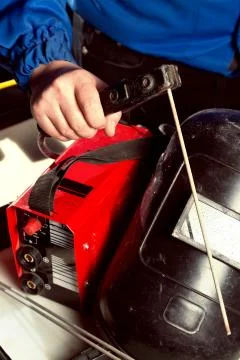 Welding unit with helmet shield Foto stock