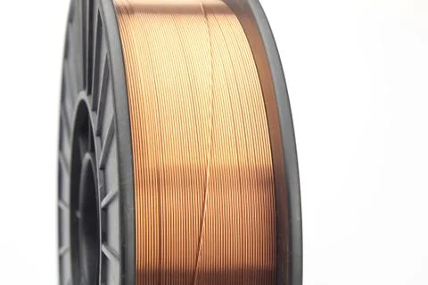 Welding wire on a coil for a semi-automatic swirl. Stock Photos