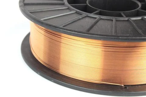 Welding wire on a coil for a semi-automatic swirl. Stock Photos