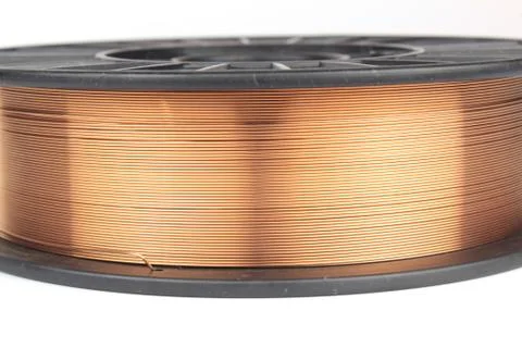 Welding wire on a coil for a semi-automatic swirl. Stock Photos