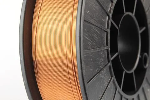 Welding wire on a coil for a semi-automatic swirl. Stock Photos